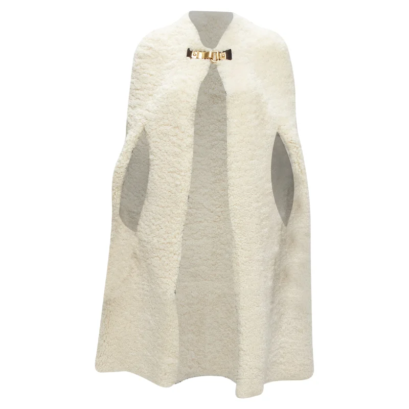 women's coats for statement-making outfitsCeline Phoebe Philo buckle shearling cape